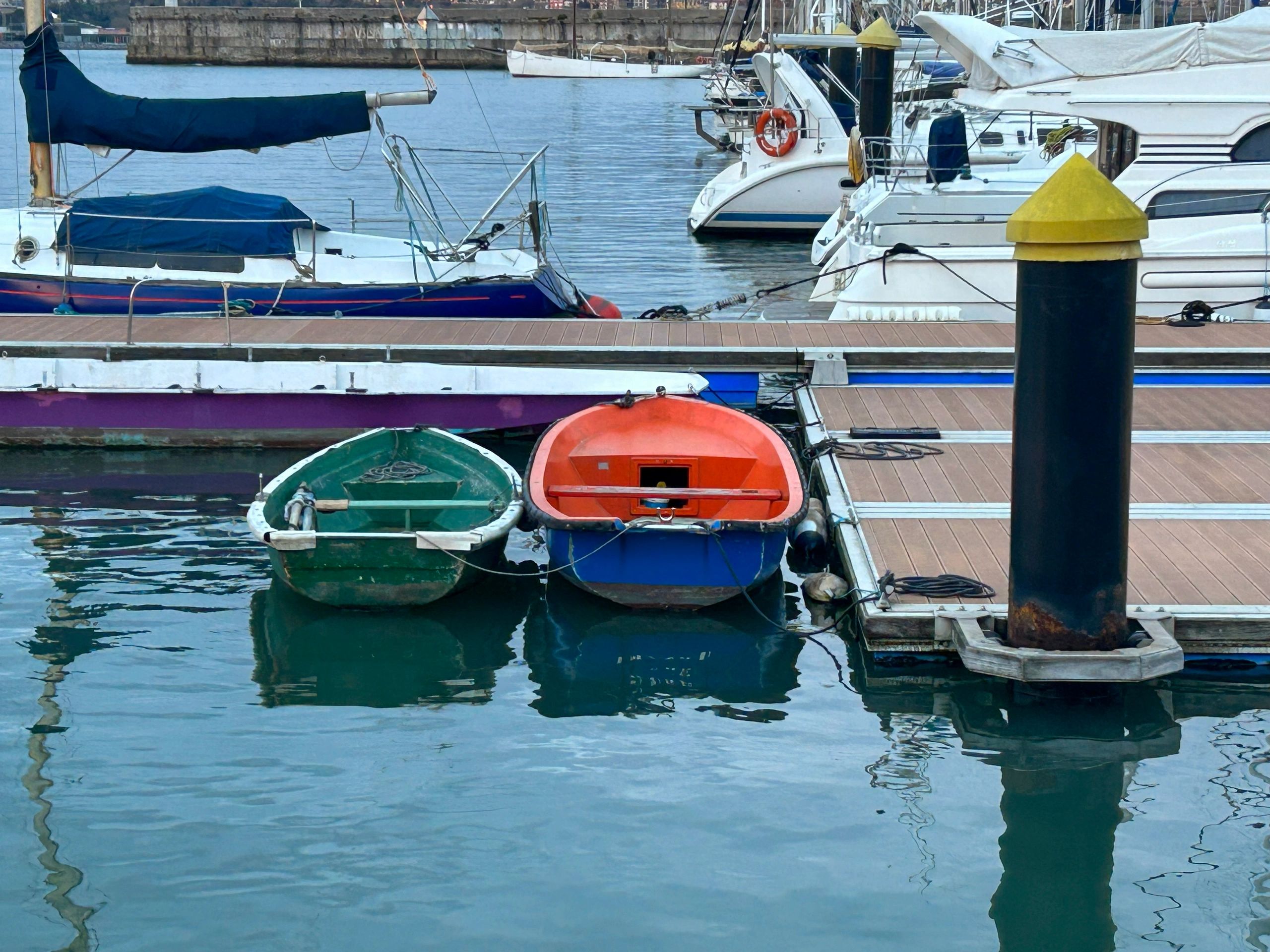 Small boats moored beside a dock